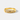 A yellow gold ring featuring two parallel channels set with baguette-cut clear stones, photographed on a clean white background.